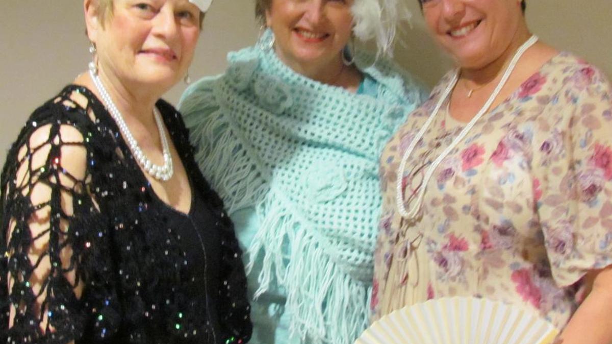 GeorgAnn Feldman (left), Gloria Fanelli and Suzanne Crossley, all of Little River, wear clothing from the past to prepare for the upcoming vintage fashion show April 30 at Our Lady Star of the Sea Catholic Church in North Myrtle Beach.