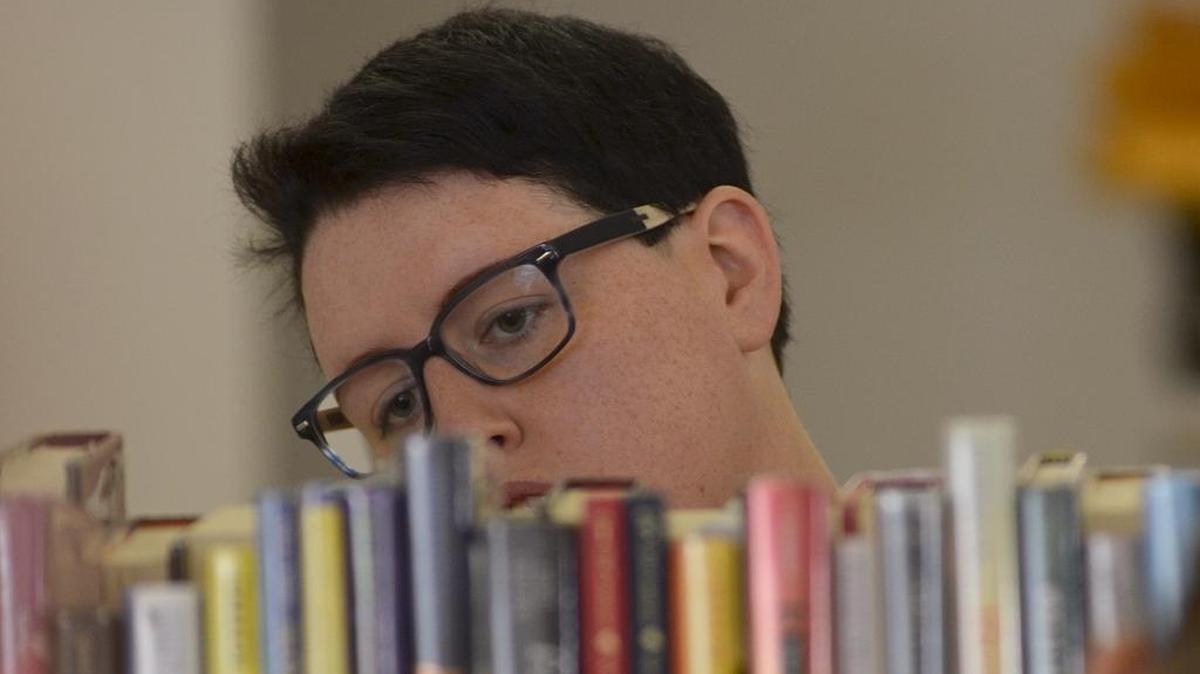 In this file photo, a buyer peruses the shelves at a Horry County book sale. After a push from Moms for Liberty, the Horry County School Board voted in April 2024 to ban “The Freedom Writers Diary” by Erin Gruwell from school libraries. The book was already limited to use by teachers only.