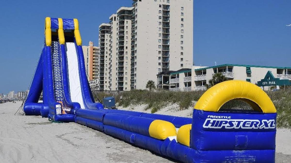 North Myrtle Beach’s new Hipster XL inflatable beach slide is open 10 a.m.-5 p.m. daily through Sept. 5 in at the city’s Ocean Park, at First Avenue South and Ocean Boulevard, one block south of Main Street. It’s 40 feet tall, 27 feet wide, and about 175 feet long. Single- and four-ride rates, and weekly and season passes, are available. Details 843-280-5674, 843-280-5620 or parks.nmb.us/Page.aspx?id=16.