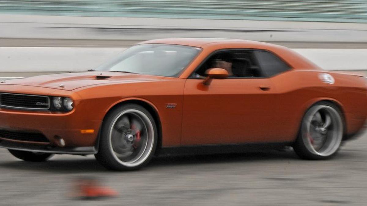 
Look for cars like this 2011 Toxic Orange Dodge Challenger SRT-8 during the “Mopars at the Beach” Classic & Modern Muscle Car Show, 8 a.m.-5 p.m. Saturday at Broadway at the Beach, at 21st Avenue North and Robert Grissom Parkway in Myrtle Beach. 
