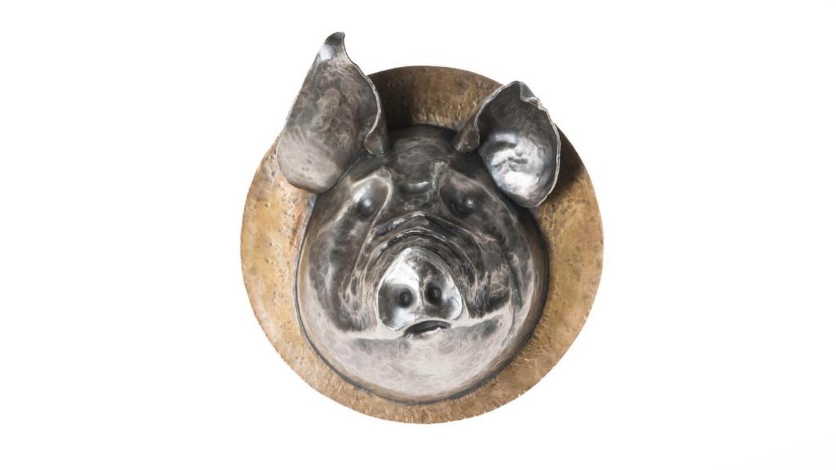 This photo shows “Low on the Hog: Headcheese,” made of red brass and sterling silver, and part of the “Logan Woodle: Blessed Burdens” exhibit, with 19 metal and wood sculptures, through Dec. 30 at the Franklin G. Burroughs-Simeon B. Chapin Art Museum, 3100 S. Ocean Blvd., Myrtle Beach, open 10 a.m.-4 p.m. Tuesdays-Saturdays (but not Thanksgiving Day) and 1-4 p.m. Sundays, with free admission. Details at 843-238-2510 or myrtlebeachartmuseum.org.