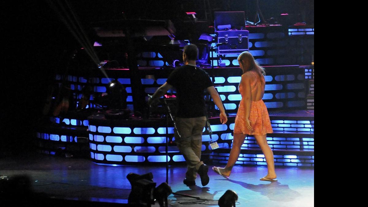 
Amber Naegele of Independence, Ky., walks off the stage after her “American Idol” audition at the Calvin Gilmore Theater in 2014.
