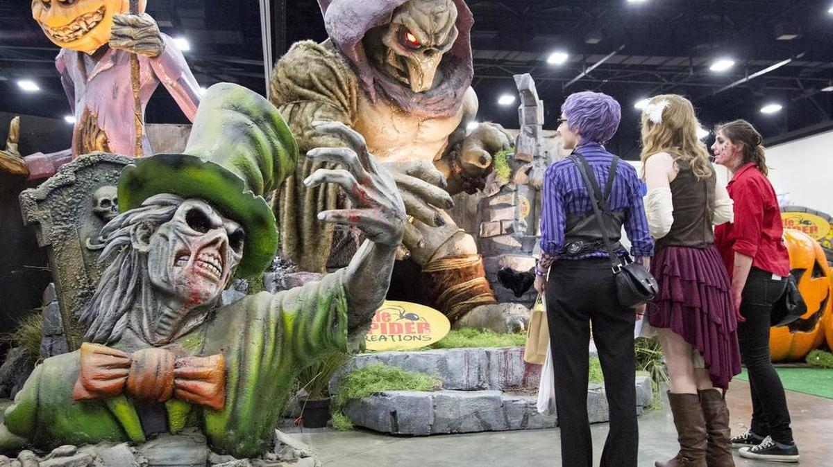 Attendees admire sculptures last year at the eighth annual“XCon World.” The 2016 event winds up 11 a.m.-5 p.m. Sunday at the Myrtle Beach Convention Center. Admission is free for ages 12 and younger.