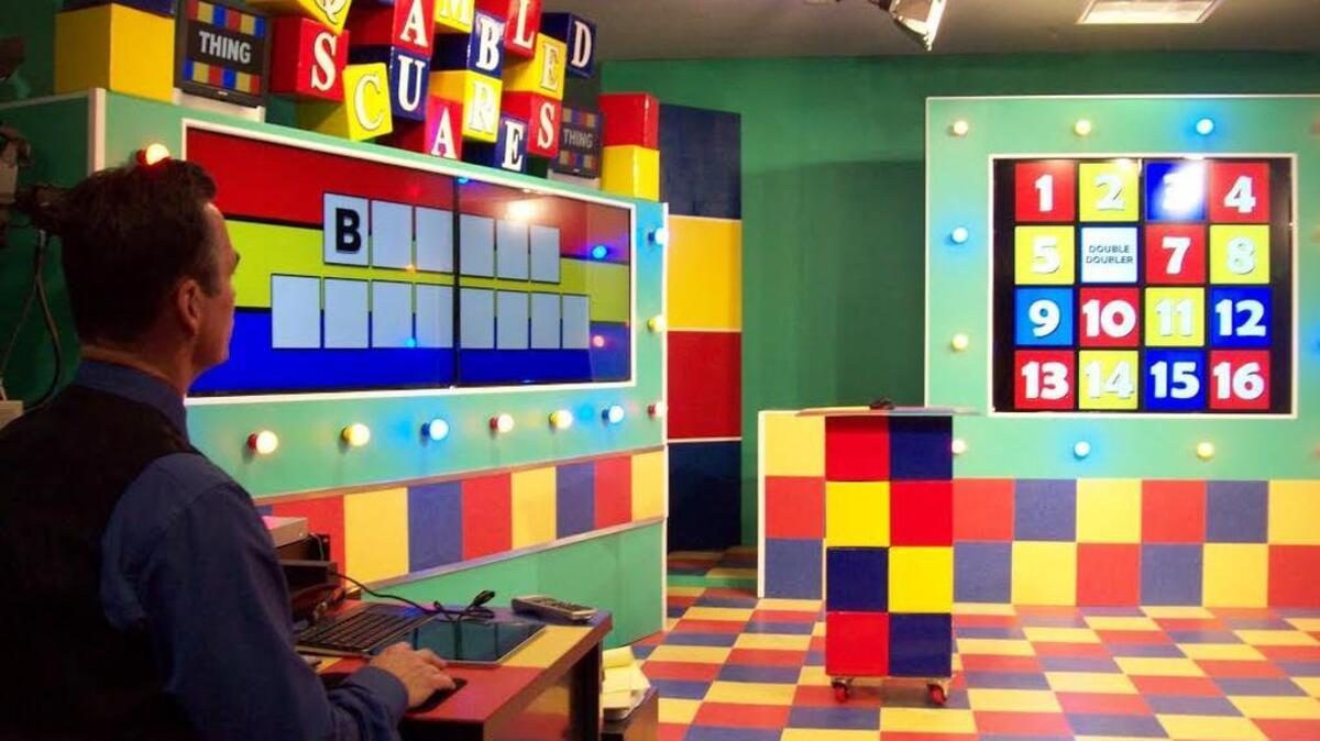 At Barefoot Landing in North Myrtle Beach, Buzz Berry checks on a digitized square in the new studio for the “Sqrambled Scuares” game show, for which a new season of filming for weekly episodes begins March 10, with the public welcome to watch, and possibly compete on camera.