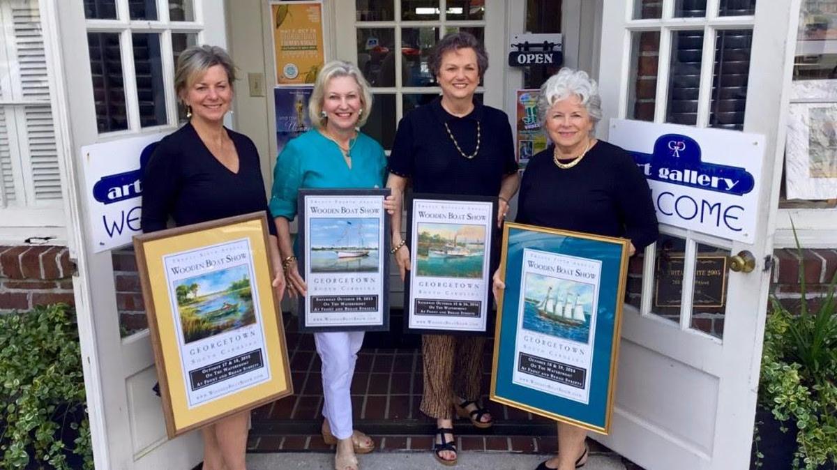 The four most recent Georgetown Wooden Boat Show artists – From left, Pat Puckett (2015), Susan Tiller (2013), Judy Maring (2016) and Johnnie Cowan (2014) also are best friends. The Harbor Historical Association of Georgetown’s 27th annual Wooden Boat Show will be 11 a.m.-6 p.m. Oct. 15 and 11 a.m.-4 p.m. Oct. 16 on Front Street in Georgetown. Details at 843-520-0111, 843-545-0015 or woodenboatshow.com. Also, an art show and reception with these artists pictured is 5-8 p.m. Oct. 13 at Georgetown Art Gallery, 705 Front St., with an exhibit through Nov. 5 (843-527-7711 or www.georgetownartgallery-sc.com).