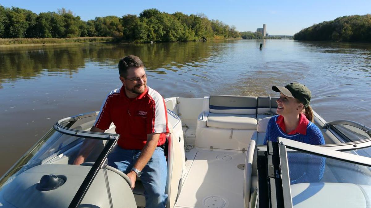 Darley Newman (right), a Myrtle Beach childhood native, is host and producer for “Travels with Darley,” a PBS series for which the third season will air 7-7:30 p.m. Fridays through April 21 on ETV across South Carolina – including WHMC-TV 23 of Conway and WITV-TV 7 of Charleston. This photo shows her on a guided river tour, during the “Illinois Ottawa & Beyond” episode, which will premiere on ETV on April 21. Details at www.travelswithdarley.com.