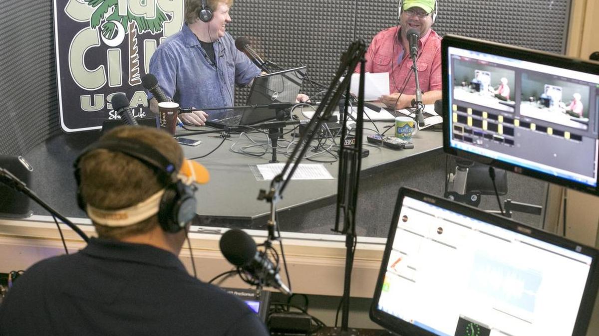 
Dustin Gilder (front) engineer, runs the boards as Bo Gilbert (left) and show host Jim Quick produce a live radio broadcast of “The Crossover Show,” a weekly event 10 a.m.-noon Tuesdays with new and classic beach music.
