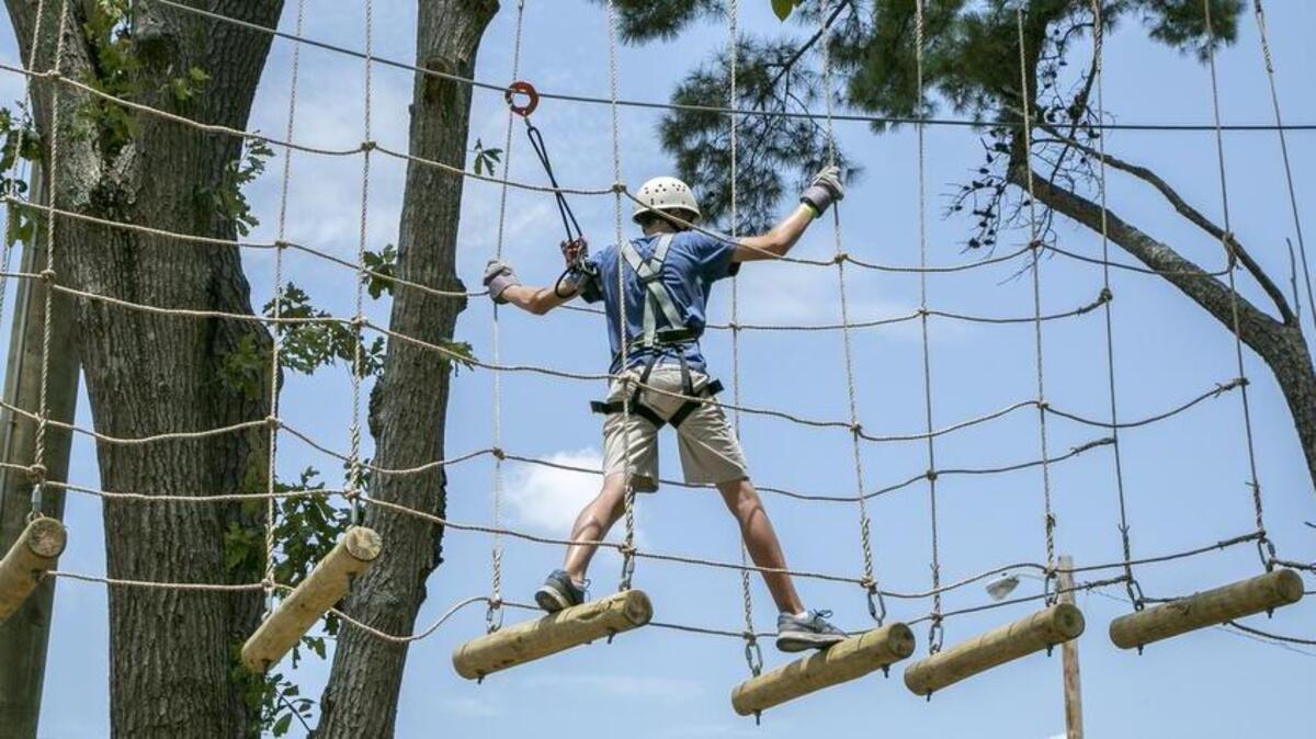 
Radical Ropes opened July in Myrtle Beach. Eight ziplines surround the park for an hour and a half guided tour. The 72-element “aerial adventure park” increases in difficulty as it rises into the trees. The 65-foot climbing wall will feature a “leap of faith” platform, coming soon, that will allow climbers a few moments of free fall before being slowly lowered to the ground.
