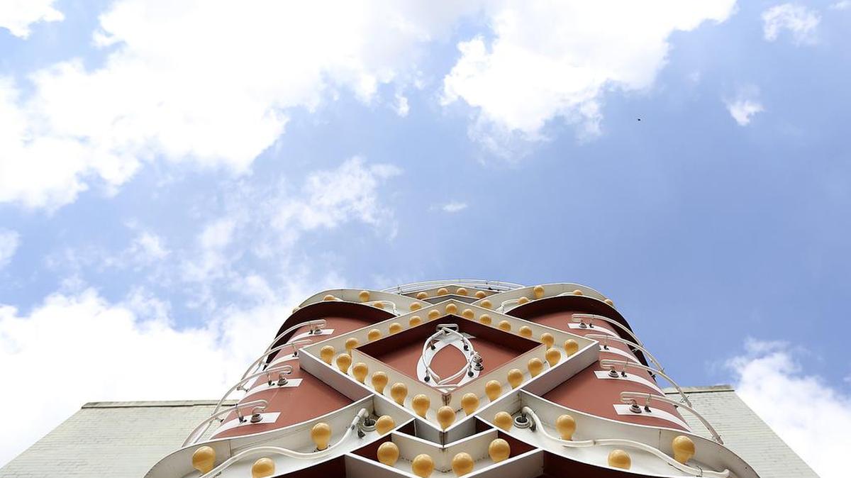 This photo shows a look up at the marquee of the historic Strand Theater, on Front Street in Georgetown, where the Swamp Fox Players, after interior renovations since winter, will begin a new year of of shows on May 20 with “The Fantasticks.”
