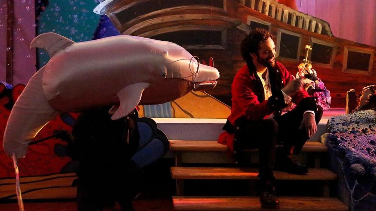 Captain Christmas, played by Jonah Ho’okano, interacts with Dolly the Dolphin, a puppet operated by Shoshana Bass, during a “Christmas Under the Sea” show at “Christmas Wonderland,” nightly through Dec. 31 at the North Myrtle Beach Park & Sports Complex.