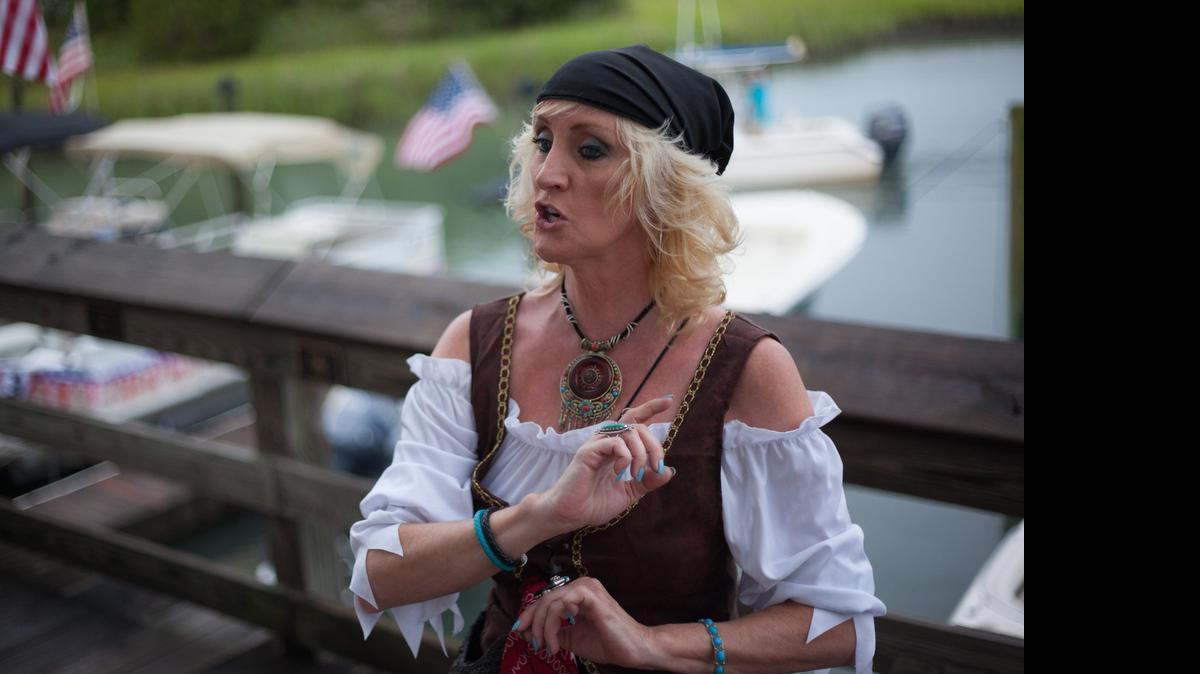 
Christine Vernon leads a ghost tour along the MarshWalk in Murrells Inlet July 3.
