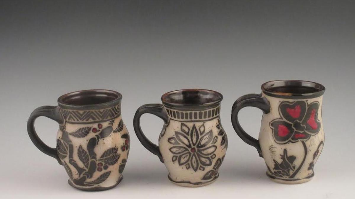 This photo shows a set of mugs in “Tarheel Wandering: a Journey in Black & White,” an exhibit of sgraffito pottery by Raine Middleton, opening Wednesday, and including an opening night reception 5-7 p.m., at Sunset River Marketplace, 10283 Beach Drive S.W. (N.C. 179), Calabash. The show lasts through July 29, and the gallery is open 10 a.m.-5 p.m. Mondays-Saturdays. Details at 910-575-5999 or www.sunsetrivermarketplace.com.