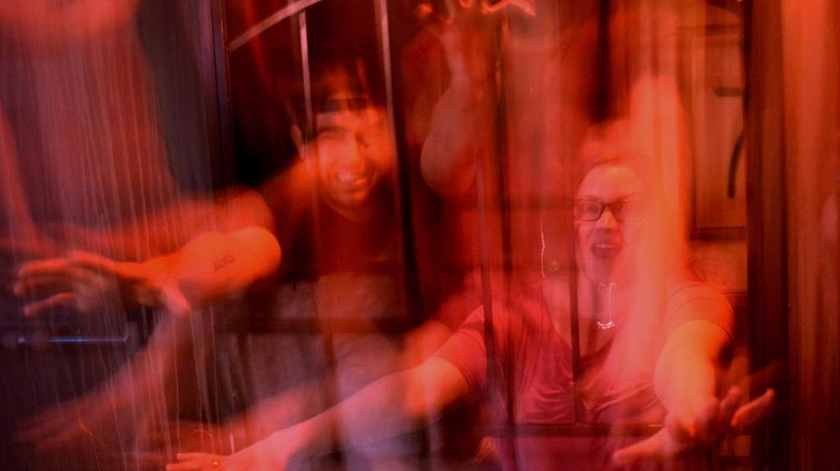 Jenn Whitehurst and Todd Laird move like ghosts, sending clues in the serial killer room.