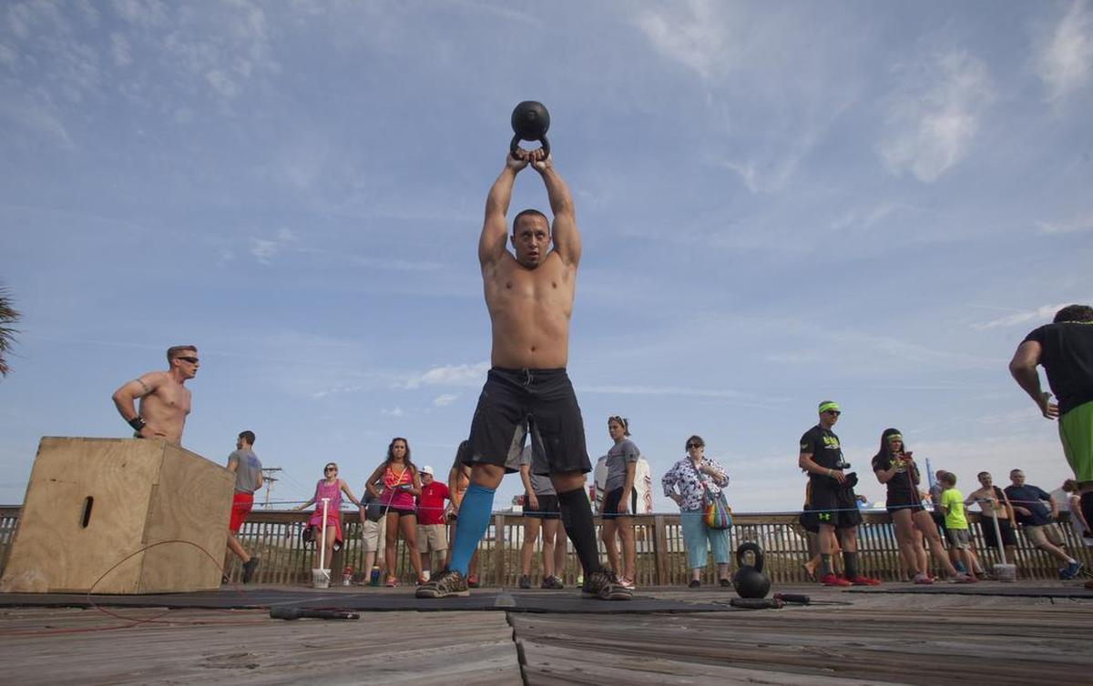  Dane Martin of Crossfit Grand Strand and a resident of Myrtle Beach, takes part in the Crossfit Summer Games Saturday in Myrtle Beach in 2014. File photo.