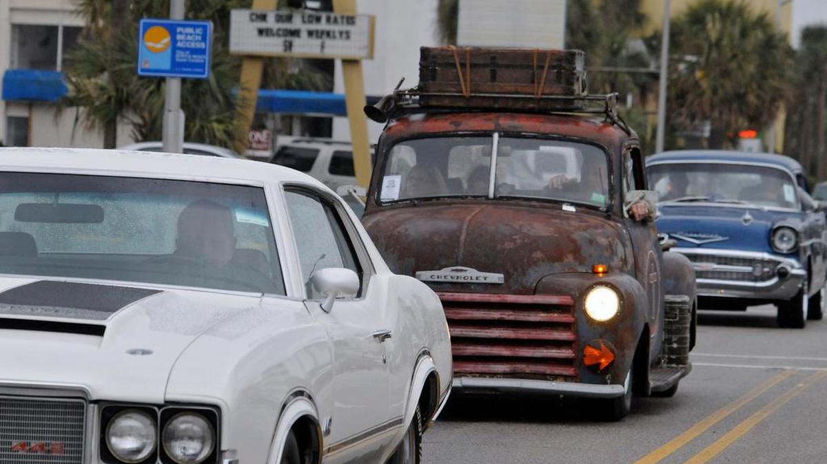 A smaller than usual group of vehicles attending the Pee Dee Street Rodders 27th annual Run to the Sun car show braved the cool rainy evening for their annual cruise down Myrtle Beach's Ocean Boulevard.