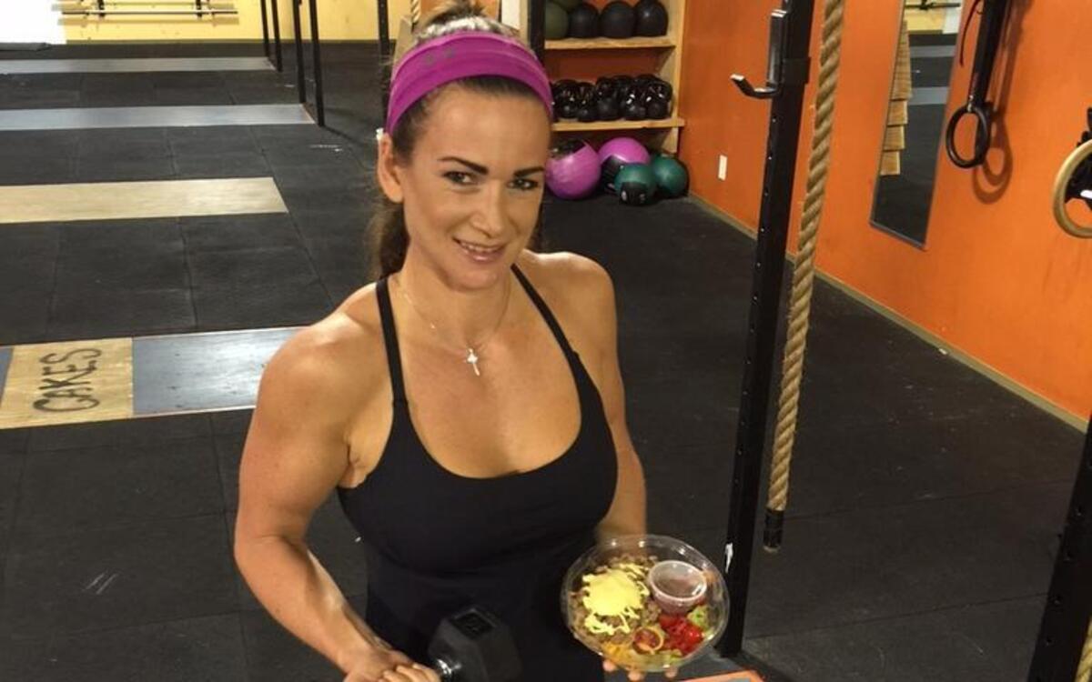 
Lyndsay Braswell poses with one of her Pump Cafe meals at Core Fitness in Myrtle Beach. Courtesy photo.
