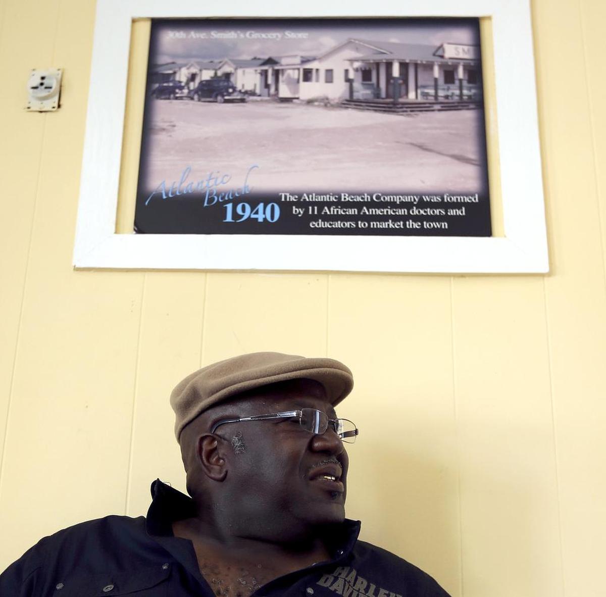 Cleo Shields talks about the history of the Atlantic Beach Memorial Day Bikefest as it relates to the originating Carolina Knight Riders motorcycle club on June 26, 2014, at the Atlantic Beach Town Hall. 