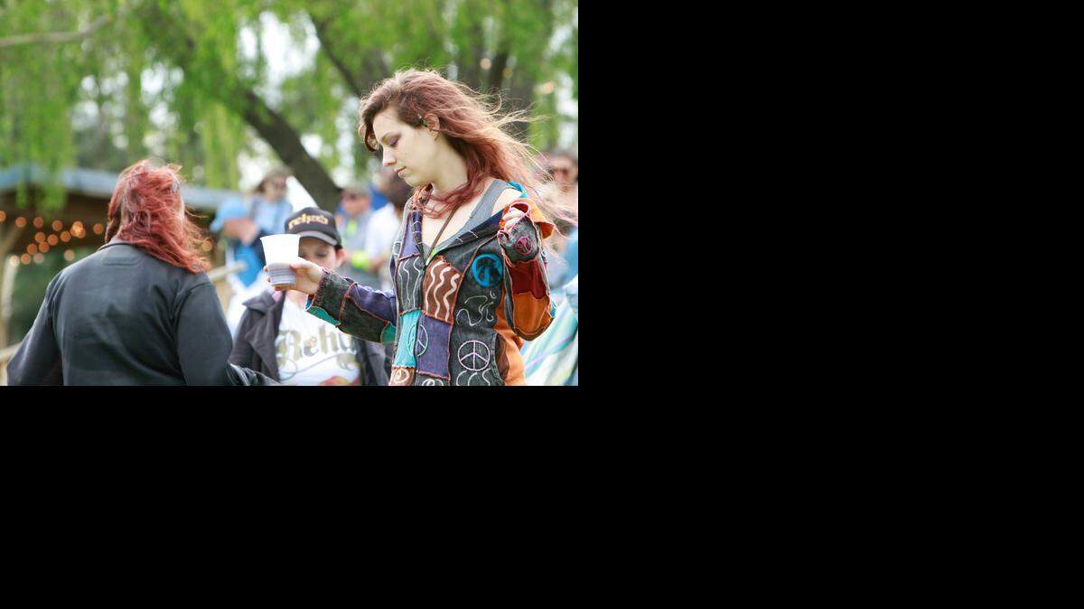 
Kaity Essel of Conway dances at The Annual Earth Day Music Fest The Boathouse in Myrtle Beach in 2013. File photo.
