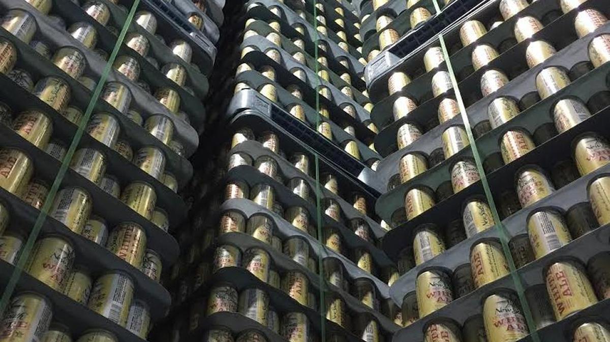 Can stacks at New South Brewing in Myrtle Beach. Photo by Kristen West for The Surge.