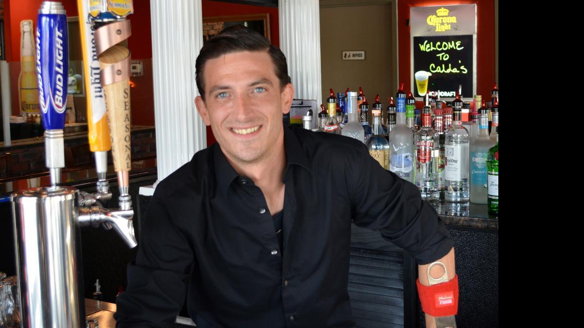 
Christopher Brandell at Calda's Coal Fire Pizza and Sports Bar in Myrtle Beach. Photo by Derrick Bracey for The Surge.
