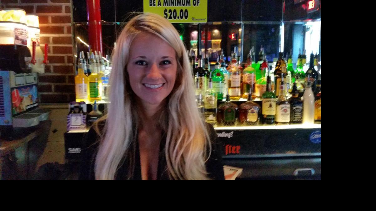 
Mallory Russell tends bar at Crocodile Rocks. Photo by Mandy Rogers, for The Surge.
