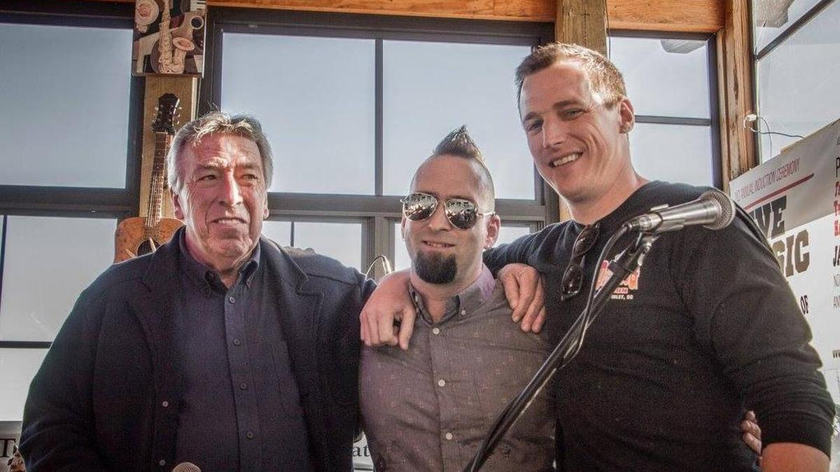Charlie Cambell, Ronnie O’Briant and John Campbell owners of the Dead Dog Saloon, at January’s Rock ‘n’ Roll Hall of Fame induction ceremony. Courtesy photo.