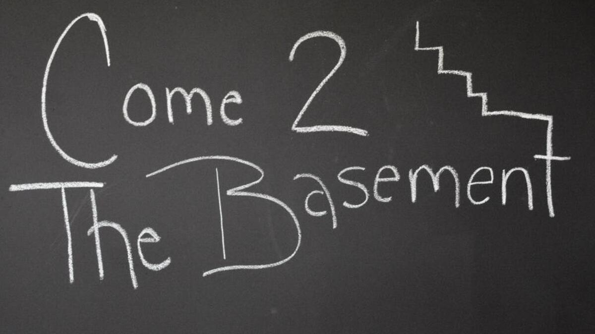 
The Basement features a changing chalkboard. Photo by Derrick Bracey, for The Surge.
