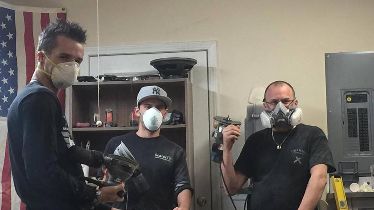 Colin Dzur, Sal Dispensa and Kevin Levine working on Hot Bloxx custom cutting boards.
