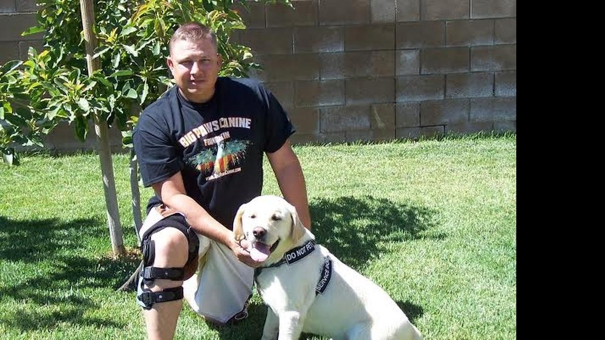 
Steve Slavik with Big Paws Canine. Courtesy photo.
