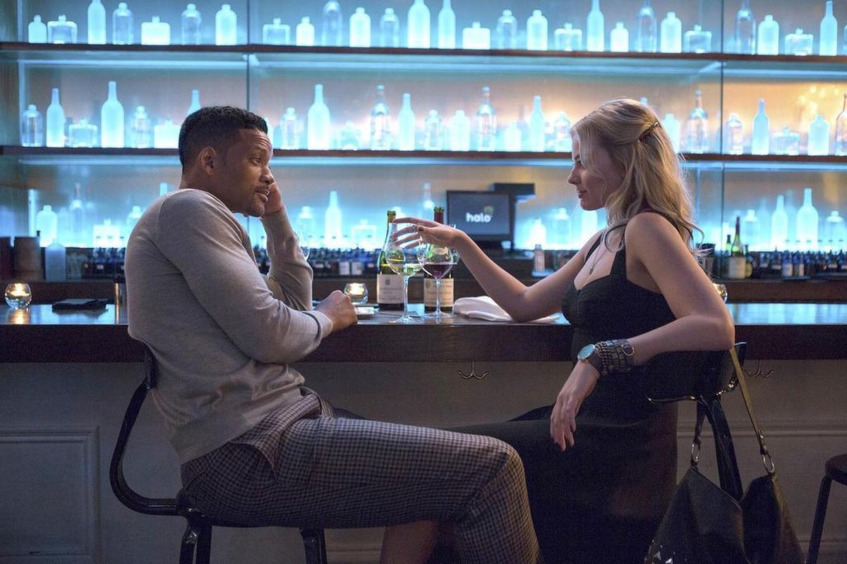 Will Smith stars as Nicky and Margot Robbie as Jess in the heist film “Focus.”