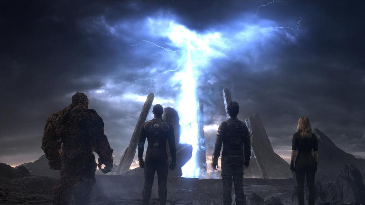 
This photo provided by courtesy Twentieth Century Fox shows, The Thing (from left) Michael B. Jordan as Johnny Storm, Miles Teller as Dr. Reed Richards, and Kate Mara as Sue Storm, in a scene from the film, “Fantastic Four.”
