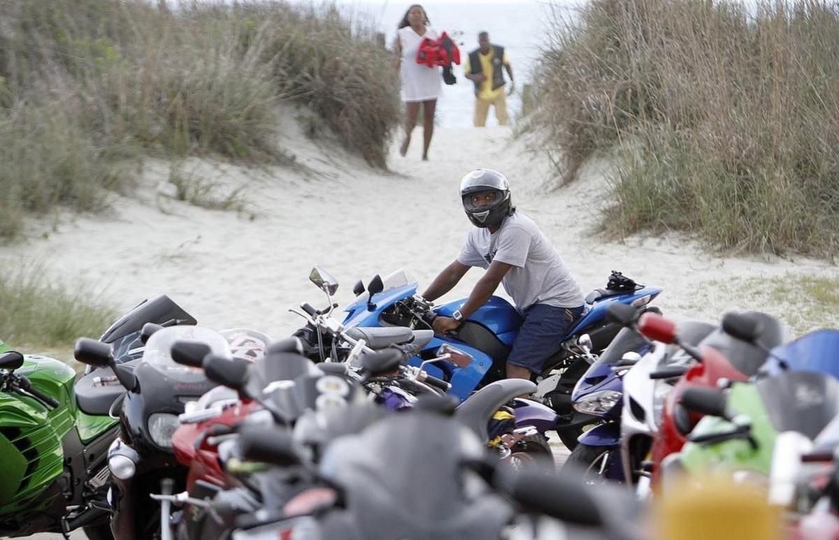 People and motorcycles are beginning to fill the streets in Atlantic Beach during the annual Memorial Day Bikefest in 2014. 