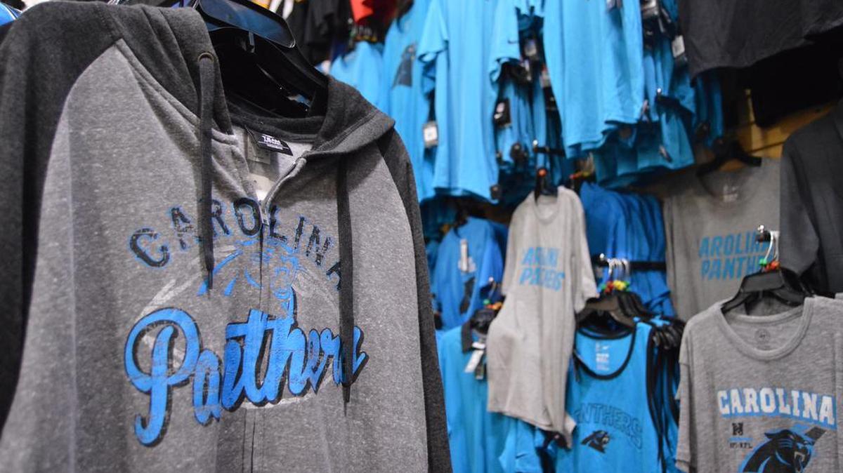 Carolina Panthers merchandise lines the walls at Lidz Locker Room at Coastal Grand Mall in Myrtle Beach. Photo by Josh Bell for The Surge.
