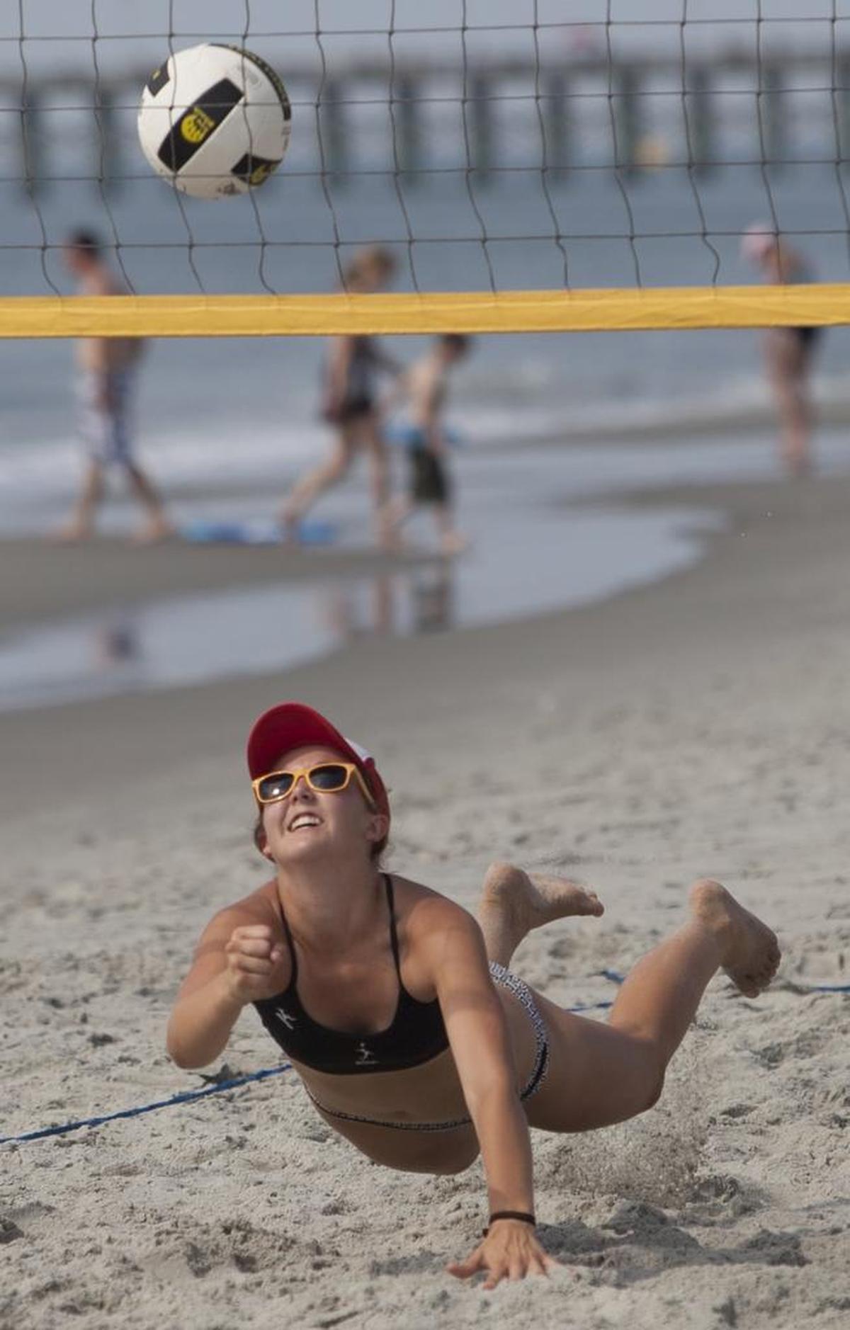 Volleyball competitor Lauren Buss of Greensboro, N.C., goes for the ball during The Salt Games in downtown Myrtle Beach in 2014. File photo.