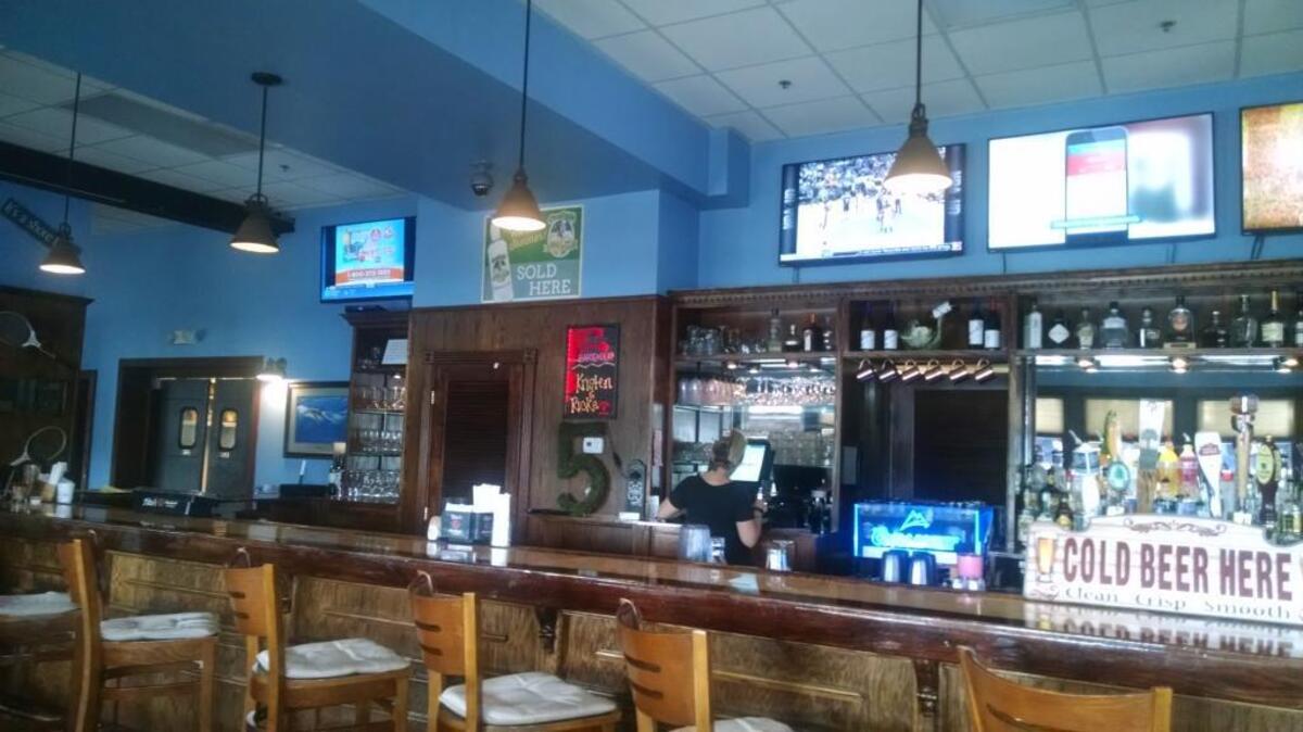 
Happy hour runs Monday through Friday, from 4 to 7 p.m. There are $1 discounts on domestic beer, house wine and house mixed drinks. Five Rivers has a bank of large, flat-screen televisions that broadcast sports and a private room that can be reserved. Photo by Kelly Fuller, for The Surge.
