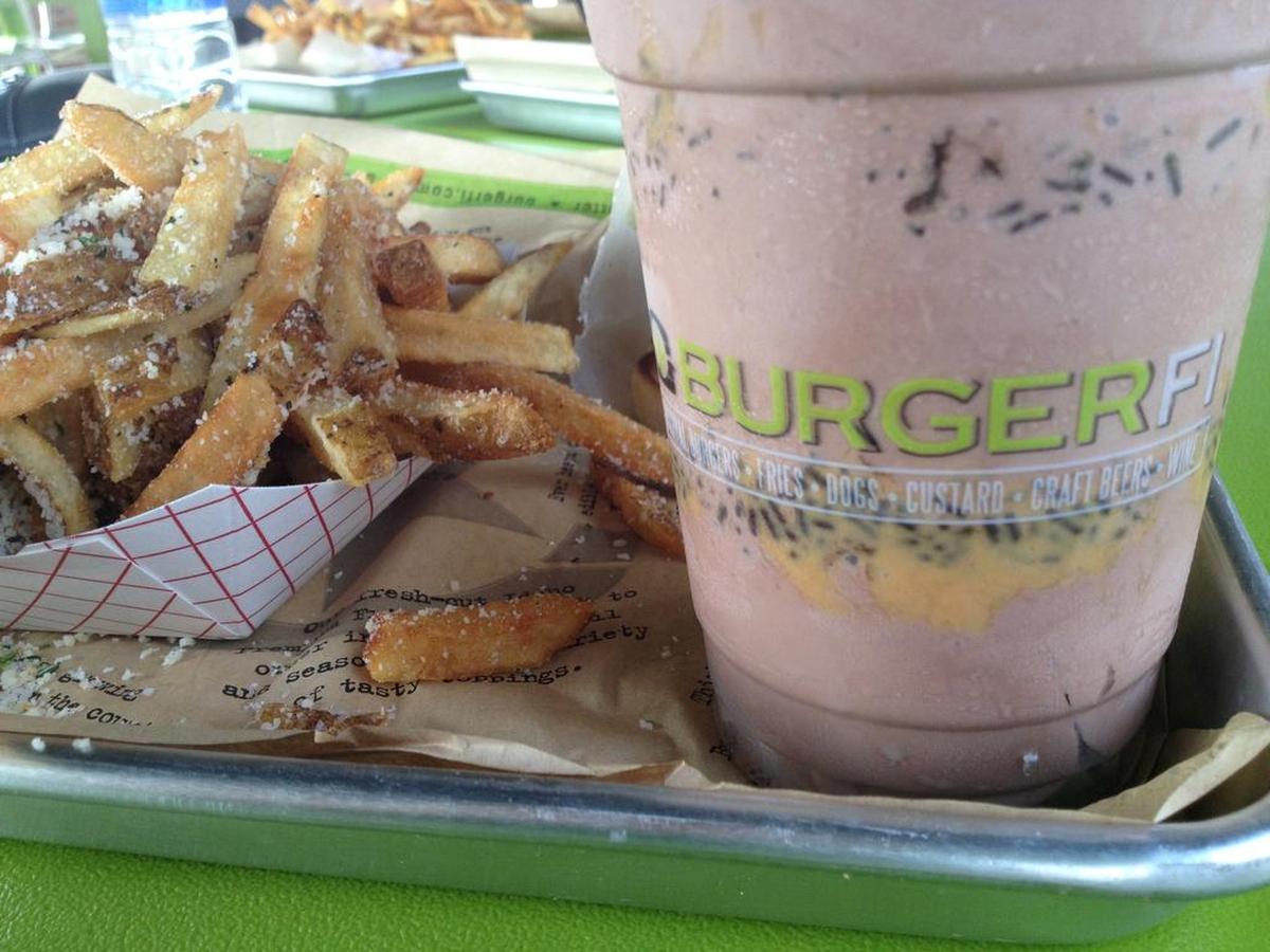 Parmesan and herb fries and a Concrete at BurgerFi in Surfside Beach. Photo by Emily Smith for The Surge.