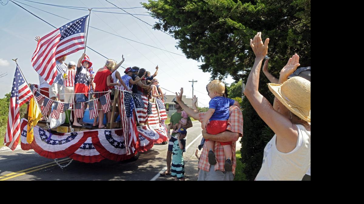 
Visitors and locals paraded down Pawleys Island on homemade floats made from boats, golf carts and flatbed trucks all decorated in red, white and blue during the Fourth of July Parade. 
