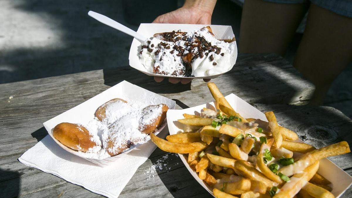 Some of the offering from the Carolina Creole food truck based out of Charleston, SC. A “Food Truck Rodeo” was hosted at Suck Bang & Blow in Murrells Inlet on Saturday with five food trucks from around the region offering their best dishes to foodies who braved the heat.