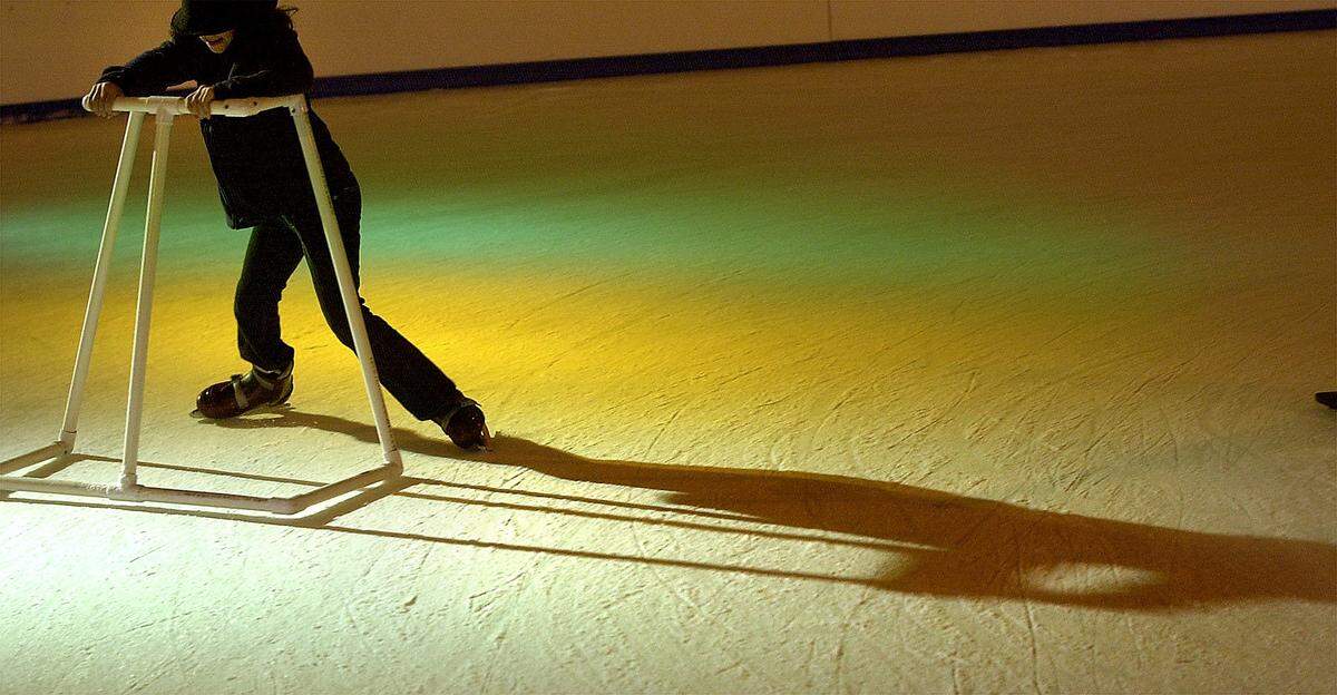 Tess Wilson, 9, tries to keep her balance at the Myrtle Beach Ice Skating Rink located in the Pavilion parking garage on Wednesday, Nov. 22, 2000. Wilson is from Athens, Ga., and is vacationing in Myrtle Beach. She said she’s skated before, but it has been a long time ago. 