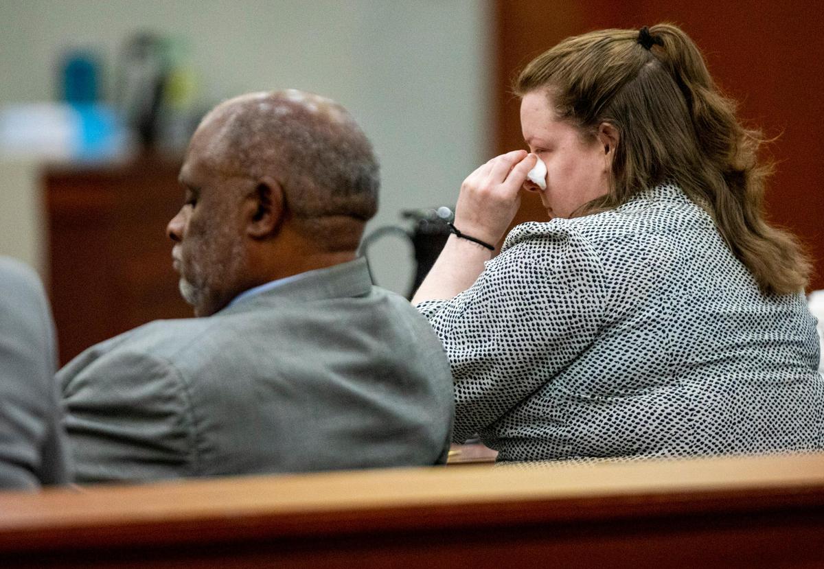 Jordan Hodge wipes her eyes as the jury enters the courtroom Thursday afternoon on the final day of her murder trial with boyfriend and co-defendant Kenneth Carlisle. Hodge and Carlisle, are on trial for two counts of murder in connection to the killing of 45-year-old William “Chet” Clemons and his 64-year-old wife, Linda McAllister.