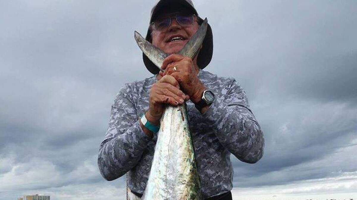Ron Lovelace shows off a 21.65-pound king mackerel he caught Tuesday off Myrtle Beach’s Apache Pier.