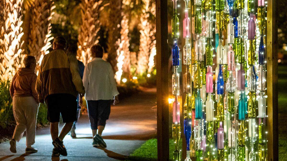 Brookgreen Gardens is hosting a Queen tribute concert in September. Tickets are available online. Above, the gardens’ 2022 “Summer Light: Art by Night” event where visitors stroll the historic sculpture gardens under the glow of ten unique lighting installations.