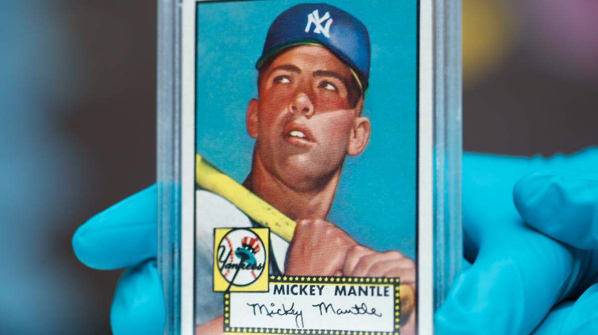 The “Holy Grail” of baseball cards, a 1952 Topps Mickey Mantle that is valued at more than $10 million, is put on display as part of baseball memorabilia exhibit at the Colorado History Museum Monday, July 16, 2018, in Denver. The pristine card, one of three known to still be in existence, is owned by Denver lawyer Marshall Fogell.