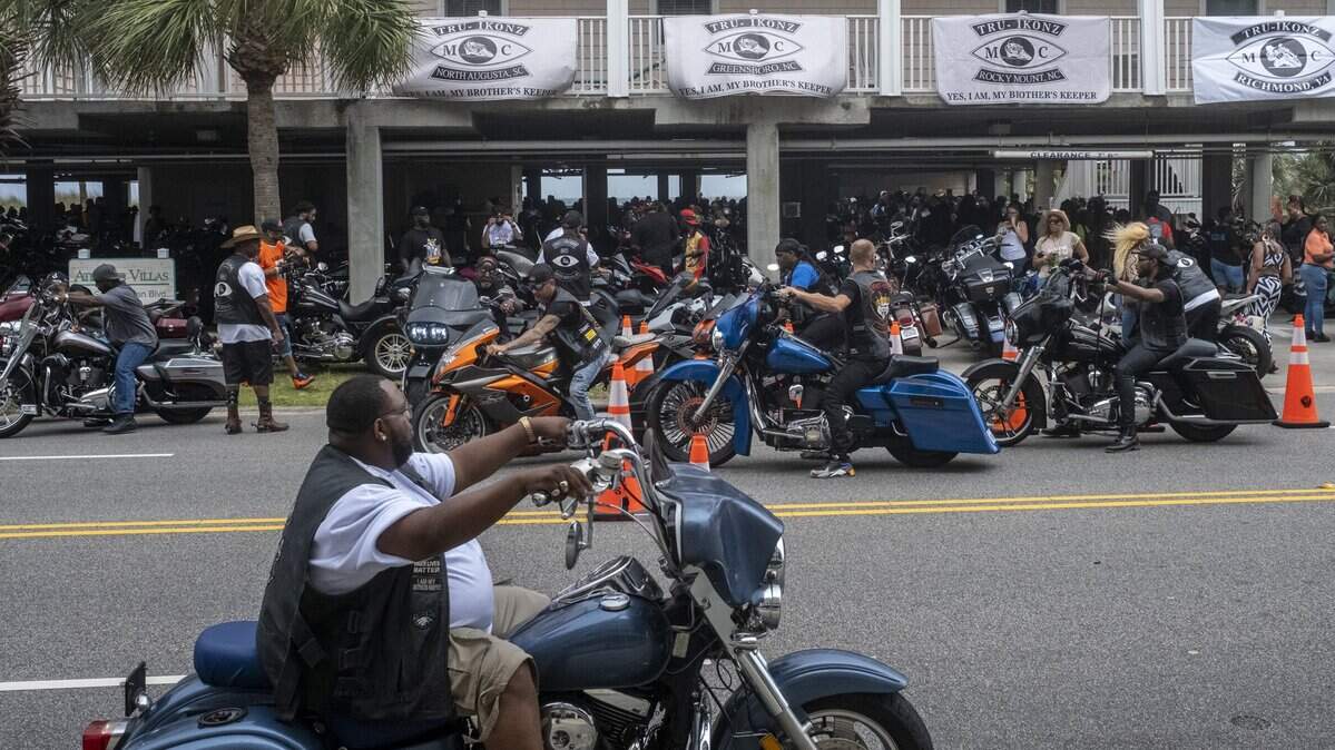 Bikers crowd into a parking garage in North Myrtle Beach for a rainy day party on Friday afternoon. The Atlantic Beach Bike Festival, aka “Black Bike Week,” returned on Friday after being canceled the last two years due to COVID-19. The event got off to a slow start in Atlantic Beach due to rain but parties were held in covered parking garages around North Myrtle Beach and as the rain cleared, the bikers returned. May 27, 2022. 