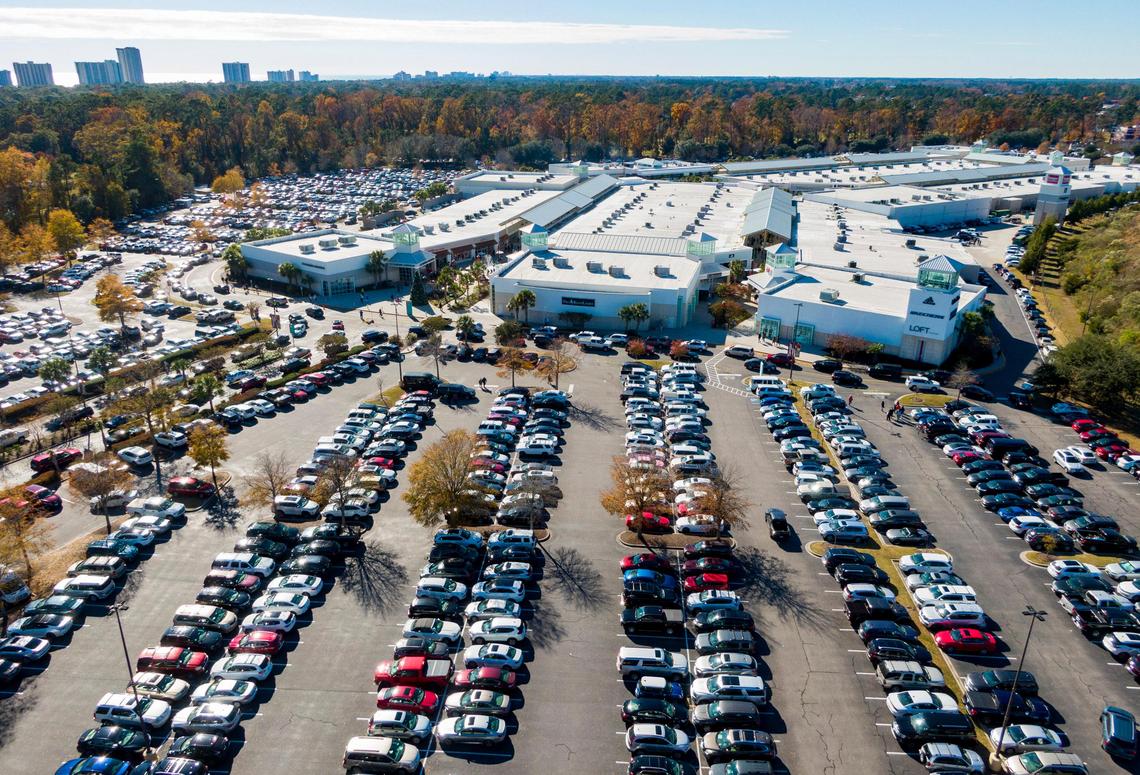 Holiday shoppers search for parking spots at Tanger Outlets in North Myrtle Beach on Black Friday after the Thanksgiving holiday. Nov. 29, 2018.