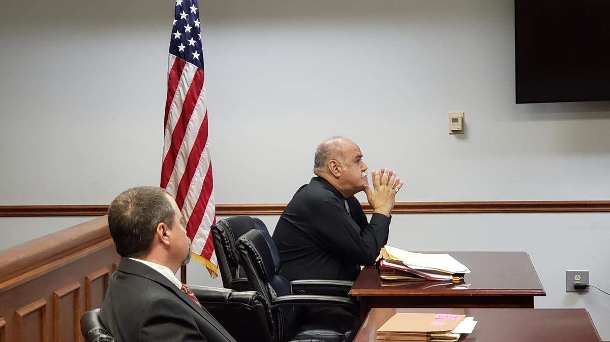 Stephen Flood sits in a Marion county courtroom for a probable cause hearing. He was one of two former Horry County deputies accused in the case of two women drowning during a transport in September 2018.