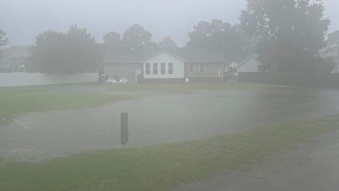 Tropical Storm Debby pours rain on Conway, roads close, cars crash, residents barbecue