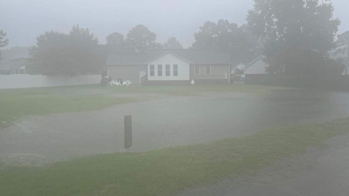 Tropical Storm Debby pours rain on Conway, roads close, cars crash, residents barbecue