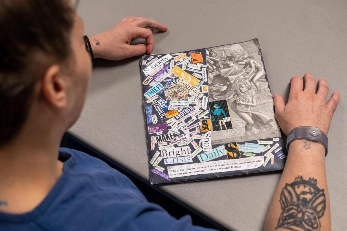 A student at J. Rueben Long Detention Center near Conway, S.C looks down at a notebook that she decorated with words of encouragement during an addiction recovery class. With new classes at J.Reuben Long Detention Center, female detainees are able to take part in “Next Step” addition recovery classes as part of the jail’s pretrial intervention program. July 5, 2023.
