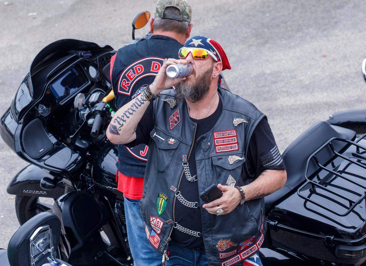 Bikers hang out at Spokes and Bones Saloon in Murrells Inlet, S.C. on Friday during the 2024 Myrtle Beach Spring Rally. May 17, 2024.